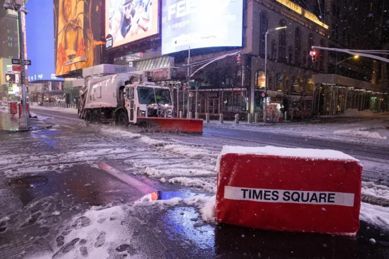 Times Square covered in snow during the bomb cyclone NYC
