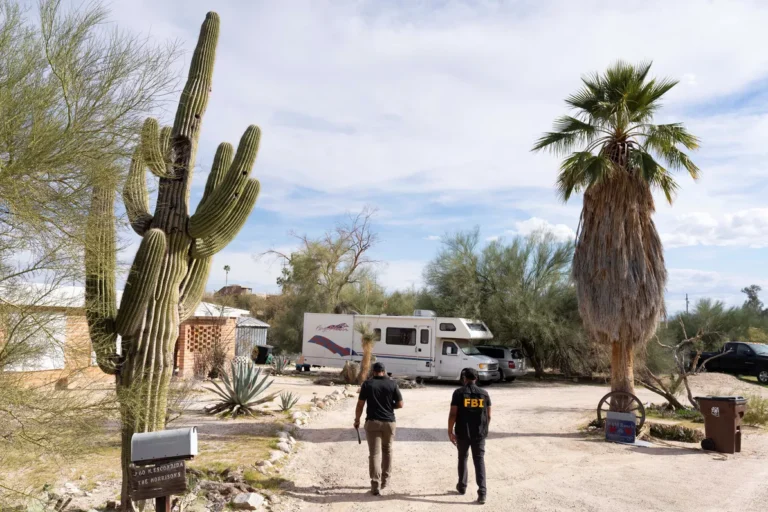 Doorbell camera image of a masked person outside Nancy Guthrie’s Tucson home