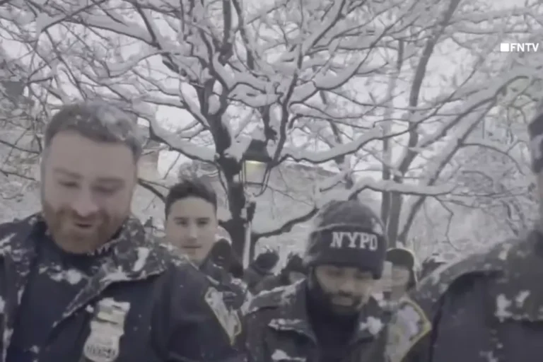 NYPD officers in Washington Square Park during snowball incident
