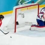 Nathan MacKinnon reacts after Canada’s Olympic final loss in Milan
