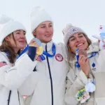 Elizabeth Lemley and Jaelin Kauf celebrate after winning gold and silver in women’s moguls in Livigno